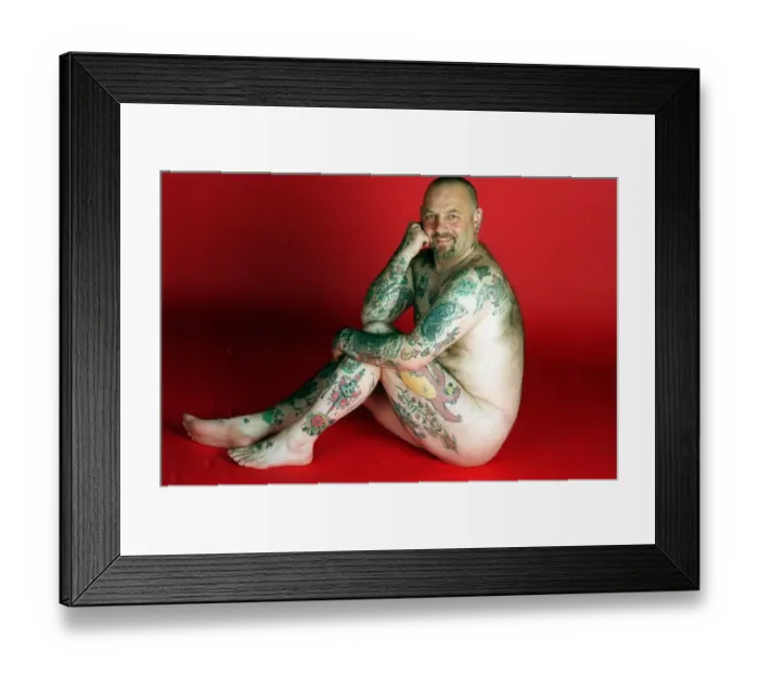 Framed Print : Gavin Boyra - Tattoo man sitting on floor naked tattoos on legs arms and back. April 1997 Framed Print : Gavin Boyra - Tattoo man sitting on floor naked tattoos on legs arms and back. April 1997