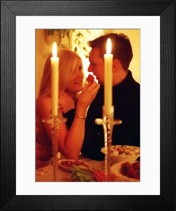 Framed Print : Lynne Calder and boyfriend Chris Sample during a romantic candle light dinner