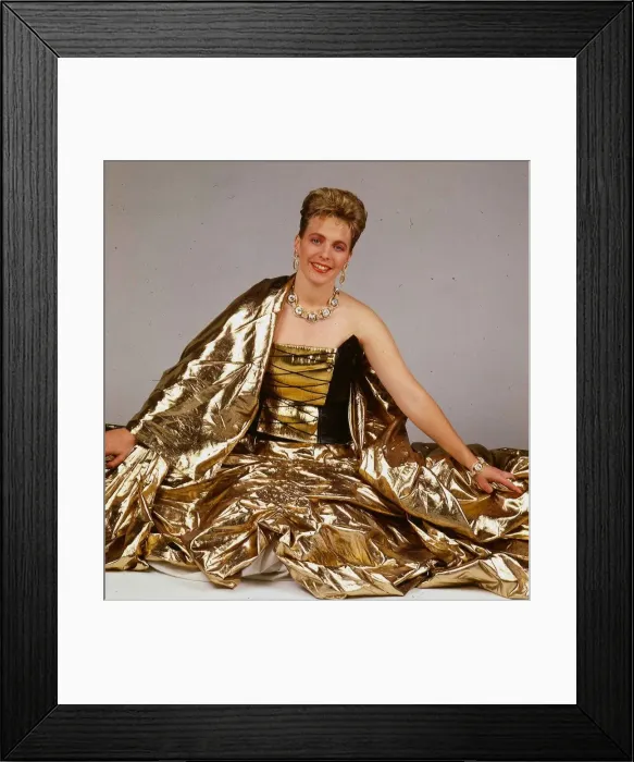 Framed Print : Hazel Irvine TV presenter September 1988 wearing gold evenign sress sitting on floor Framed Print : Hazel Irvine TV presenter September 1988 wearing gold evenign sress sitting on floor