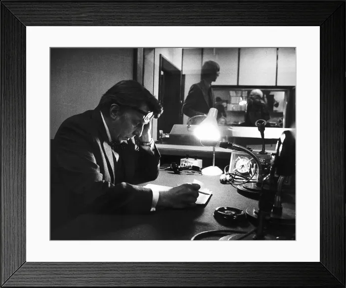 Framed Print : Sir Robin Day TV Presenter and Broadcaster sits in a radio studio studying his script Framed Print : Sir Robin Day TV Presenter and Broadcaster sits in a radio studio studying his script