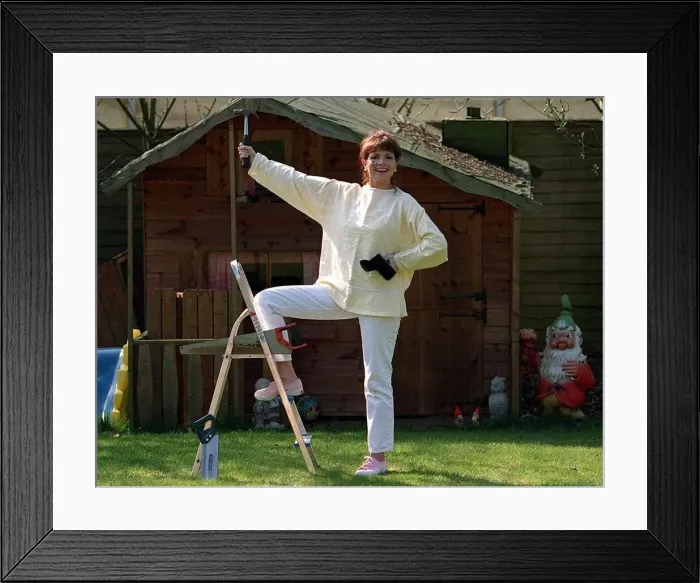 Framed Print : Denise Waterman DIY TV presenter with wendy house Framed Print : Denise Waterman DIY TV presenter with wendy house