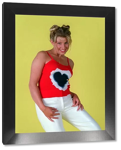 Alison Douglas TV presenter white trousers red vest black heart June 1996