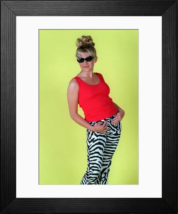 Framed Print : Alison Douglas TV Presenter wearing black and white patterned trousers