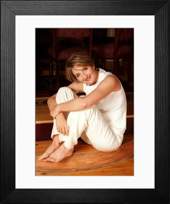 Framed Print : Kaye Adams TV presenter at home February 1999 sitting on step wearing white top trousers Framed Print : Kaye Adams TV presenter at home February 1999 sitting on step wearing white top trousers