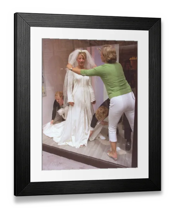 Framed Print : Berkertex Brides Shop June 1999 Maranne Crick Fashion Student standing in shop Framed Print : Berkertex Brides Shop June 1999 Maranne Crick Fashion Student standing in shop