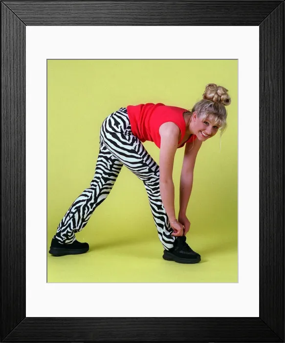 Framed Print : Alison Douglas doing exercises wearing red vest black white zebra leggings black trainers Framed Print : Alison Douglas doing exercises wearing red vest black white zebra leggings black trainers