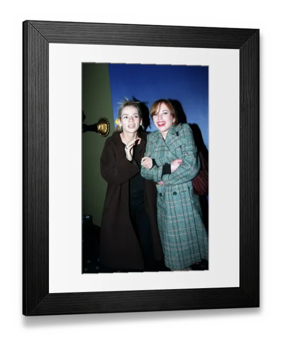 Framed Print : DJs Zoe Ball DJ and Sara Cox arrive at the afterparty for the Spice Girls
