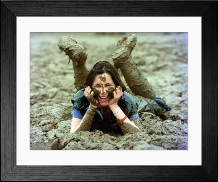 Framed Print : Lucy Rock enjoying the mud at Glastonbury festival June 1997 Framed Print : Lucy Rock enjoying the mud at Glastonbury festival June 1997
