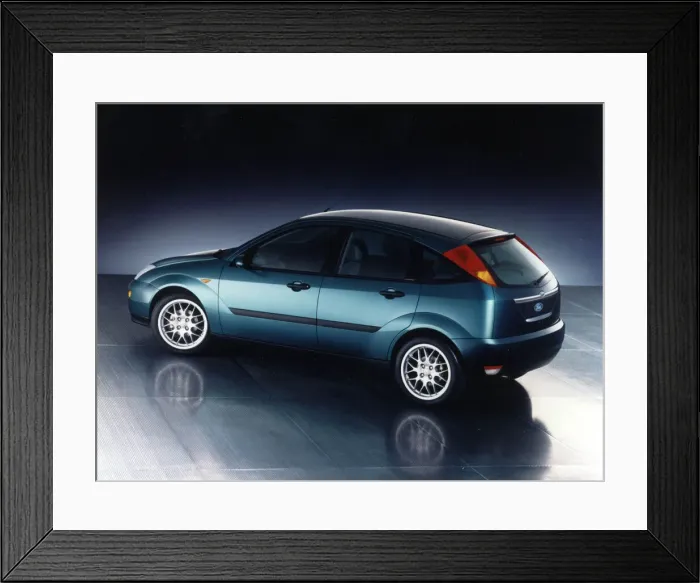 Framed Print : Ford Focus new Ford car March 1998 Metalic blue hatchback Framed Print : Ford Focus new Ford car March 1998 Metalic blue hatchback