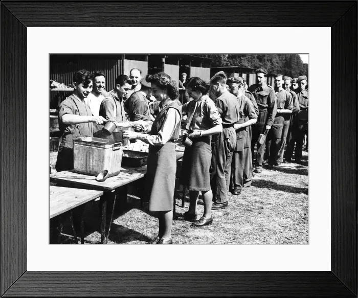 Framed Print : Members of the ATS line up with soldiers to get their first meal in France during WW2 Framed Print : Members of the ATS line up with soldiers to get their first meal in France during WW2