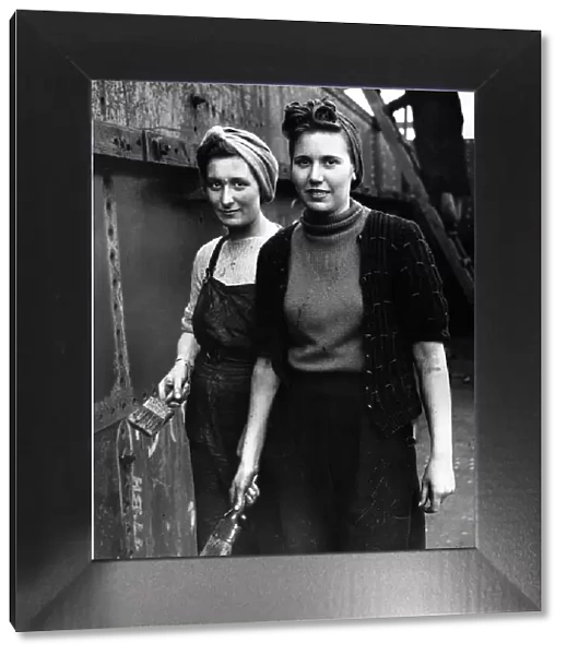 WW2 Wives of naval men working as painters in a shipyard 1942 Women Holding