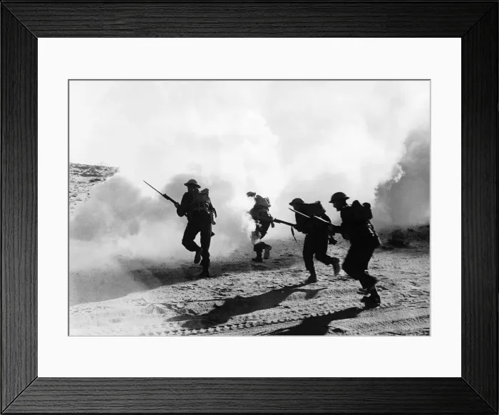 Framed Print : British troops with fixed bayonets advance through a smoke screen in the Western Desert