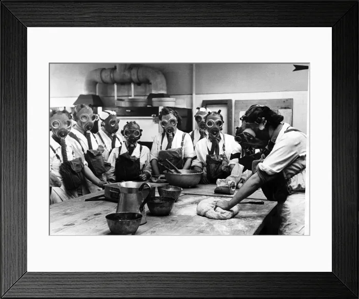 Framed Print : WW2 Army cookery school, June 1941. Women wearing gas masks while watching a
