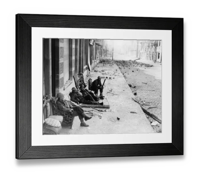 Framed Print : WW2 British troops in Louvain, Belgium take advantage of furniture left by refugees to