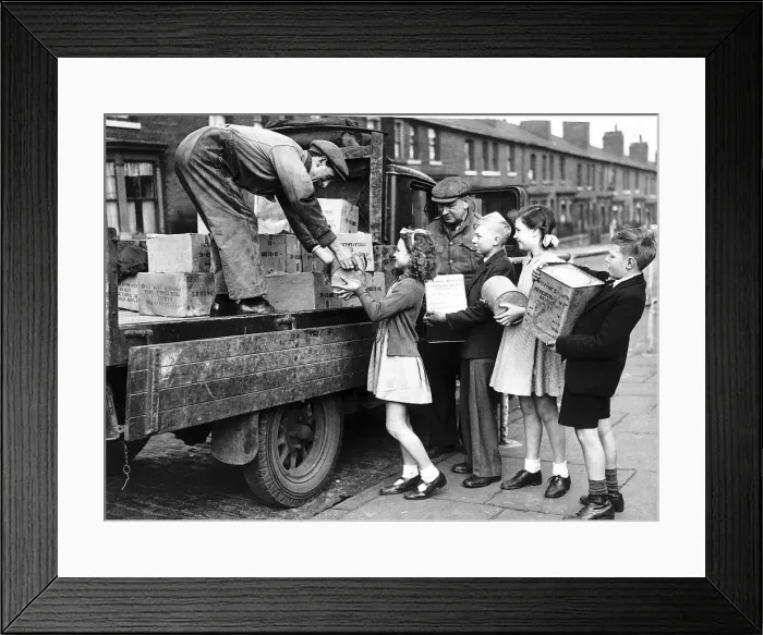 Framed Print : Children in England help load a lorry with food for the troops in Europe 1945 WW2 Framed Print : Children in England help load a lorry with food for the troops in Europe 1945 WW2