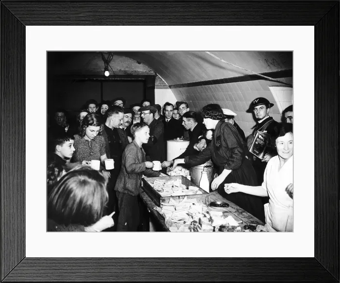 Framed Print : Womens Voluntary Service serve tea and sandwiches to people sheltering from German Framed Print : Womens Voluntary Service serve tea and sandwiches to people sheltering from German