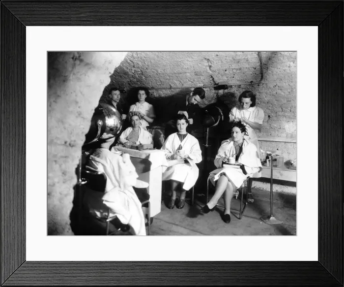Framed Print : Hairdressers carry on working in an underground air raid shelter during WW2 Framed Print : Hairdressers carry on working in an underground air raid shelter during WW2