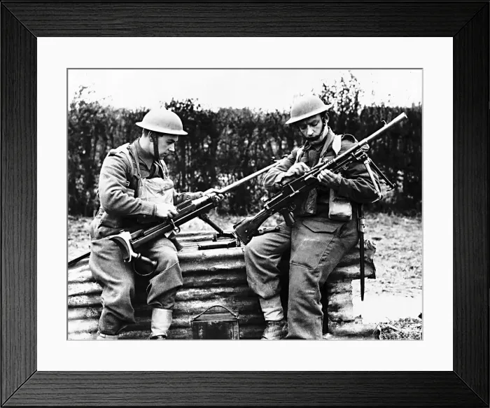 Framed Print : Troops from the 1st Border Regiment at Rumegies cleaning a Boys anti-tank regiment Framed Print : Troops from the 1st Border Regiment at Rumegies cleaning a Boys anti-tank regiment