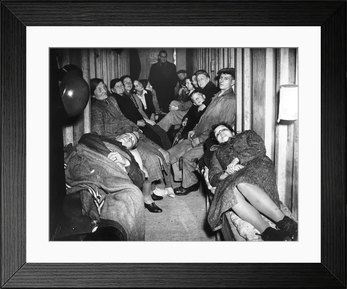 Framed Print : People sheltering in air raid shelter. 30th September 1940 first two people