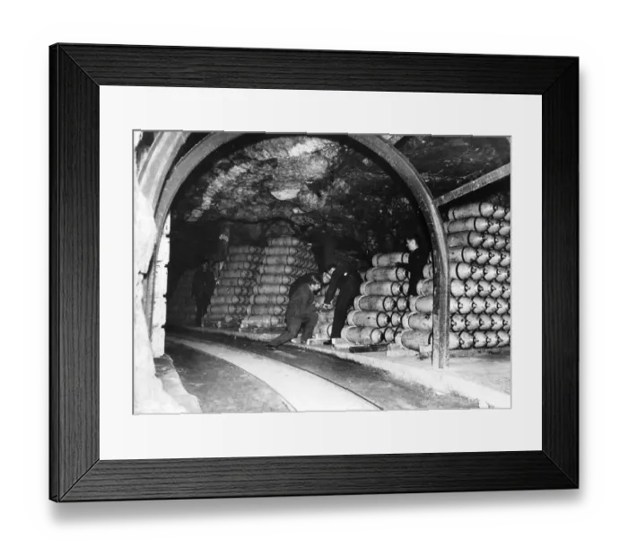 Framed Print : Bombs for the RAF are stockpiled in an underground tunnel before being transferred to