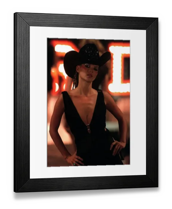 Framed Print : Kate Moss models the cowgirl look at London Fashion Week 1997 Framed Print : Kate Moss models the cowgirl look at London Fashion Week 1997