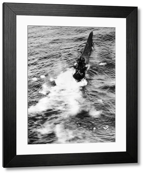 Framed Print : The crew of a sinking German U Boat scramble into the lifeboats after being hit by a Framed Print : The crew of a sinking German U Boat scramble into the lifeboats after being hit by a