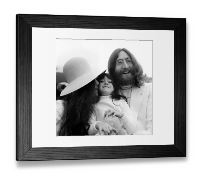 Framed Print : Beatle John Lennon and his wife Yoko Ono left Heathrow Airport London to fly to Framed Print : Beatle John Lennon and his wife Yoko Ono left Heathrow Airport London to fly to
