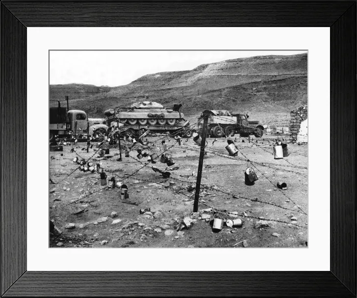 Framed Print : WW2 British tank transporter passes through an Italian wire defence in the Western Desert Framed Print : WW2 British tank transporter passes through an Italian wire defence in the Western Desert