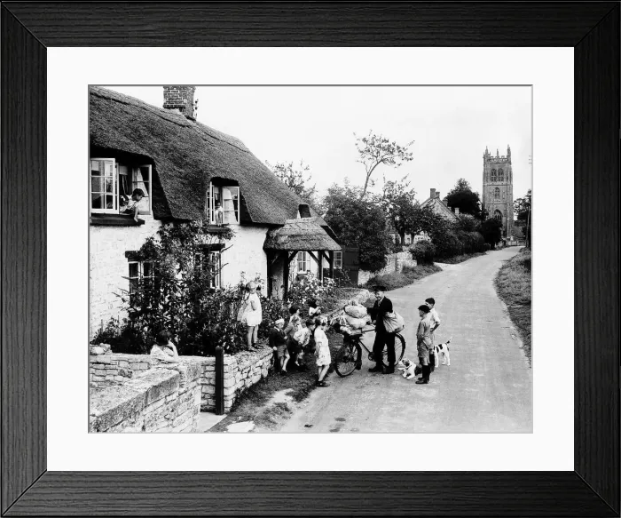 Framed Print : Evacuee children in Isle Abbott Village surround the local postman Bertie Adams hoping Framed Print : Evacuee children in Isle Abbott Village surround the local postman Bertie Adams hoping