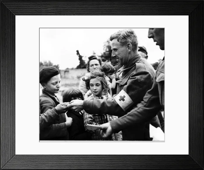 Framed Print : WW2 - June 1944 French refugees receive food from British troops Framed Print : WW2 - June 1944 French refugees receive food from British troops