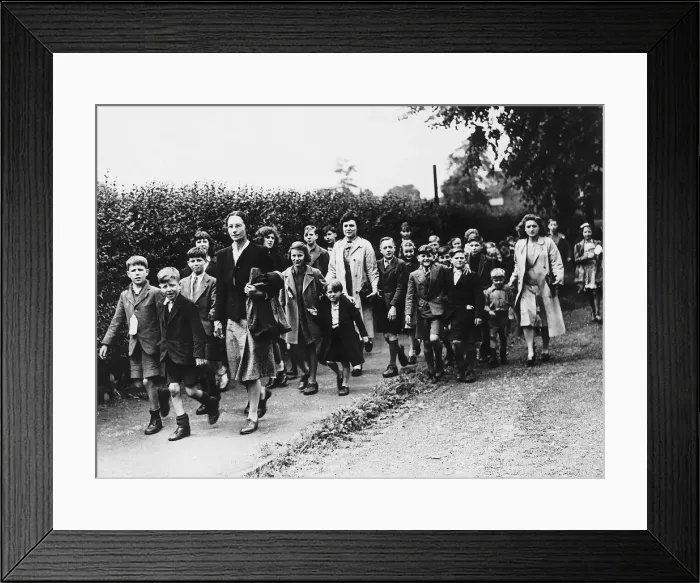 Framed Print : Schoolchildren evacuated from the major towns walk through Wilmslow in Cheshire Framed Print : Schoolchildren evacuated from the major towns walk through Wilmslow in Cheshire