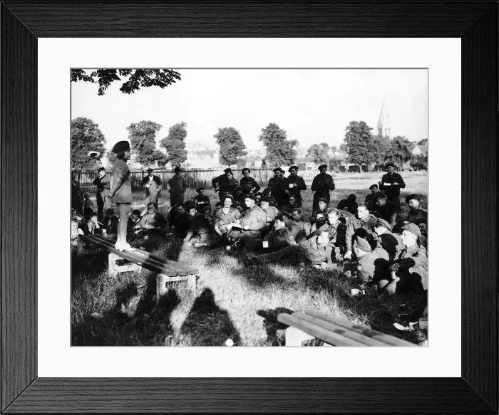 Framed Print : 10 year old Edna McCundle entertains troops waiting for the invasion of Europe 1944 WW2