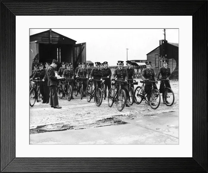 Framed Print : WaFs on an RAF base wheel out their bicycles at the end of their shifts Framed Print : WaFs on an RAF base wheel out their bicycles at the end of their shifts