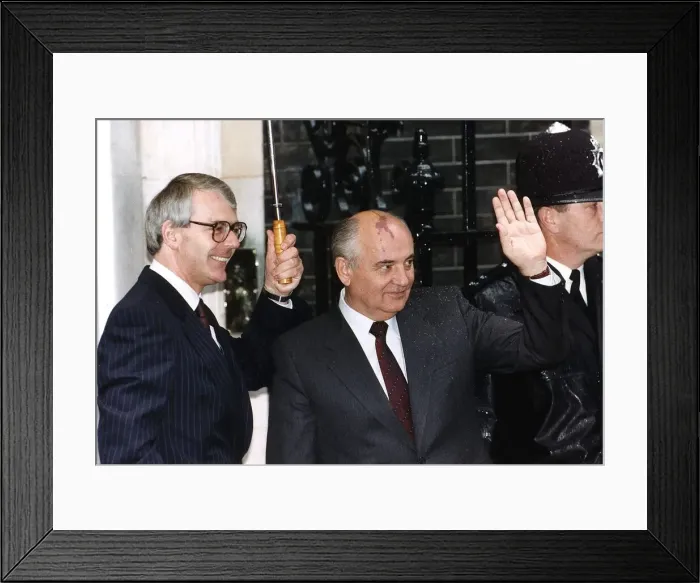 Framed Print : Mikhail Gorbachev stands with John Major under umbrella outside 10 Downing Street 1991
