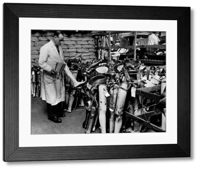 Framed Print : WW2 William Houston making artifical legs 1942 at Roehampton Hospital London Framed Print : WW2 William Houston making artifical legs 1942 at Roehampton Hospital London