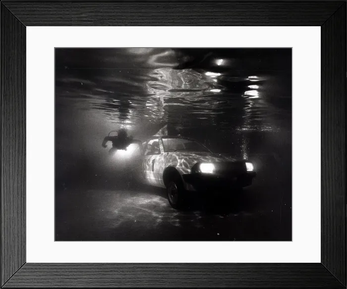 Framed Print : A Ford Escort in a swimming pool tests a new water repelant lubricant spray Framed Print : A Ford Escort in a swimming pool tests a new water repelant lubricant spray