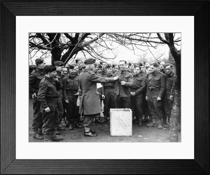 Framed Print : Sergeant Major issuing comforts to soldiers of the Suffolk Regiment Framed Print : Sergeant Major issuing comforts to soldiers of the Suffolk Regiment