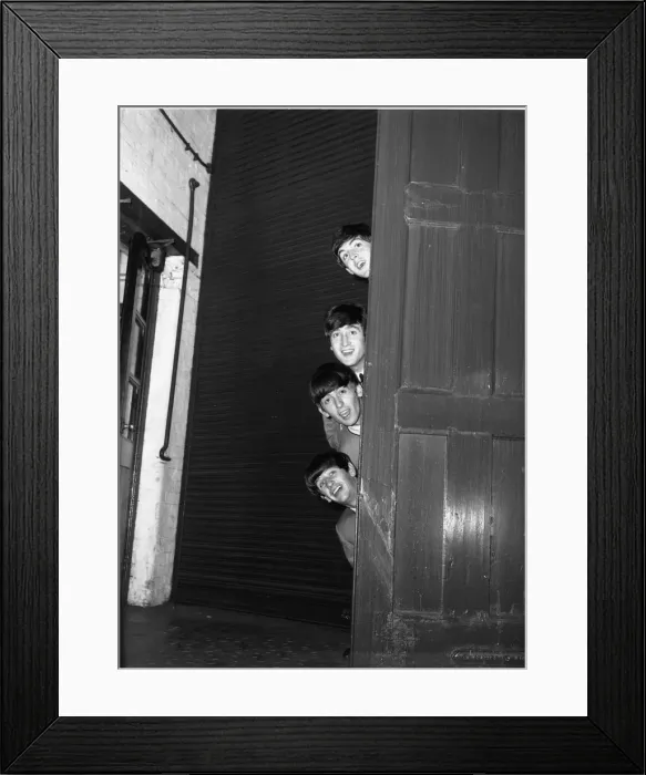 Framed Print : The Beatles peering out from behind a door. before the groups appearence at Sunday Night Framed Print : The Beatles peering out from behind a door. before the groups appearence at Sunday Night