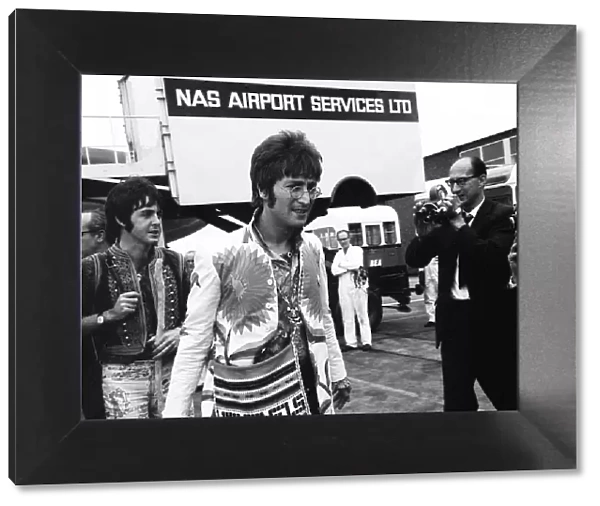 The Beatles 1967 John Lennon and Paul McCartney arriving at Heathrow Airport