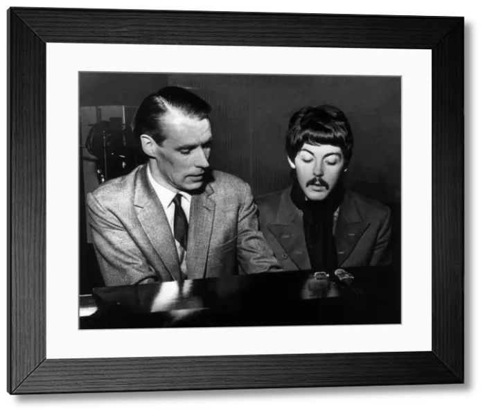 Framed Print : Paul McCartney playing the piano with producer George Martin, circa November 1966 Framed Print : Paul McCartney playing the piano with producer George Martin, circa November 1966