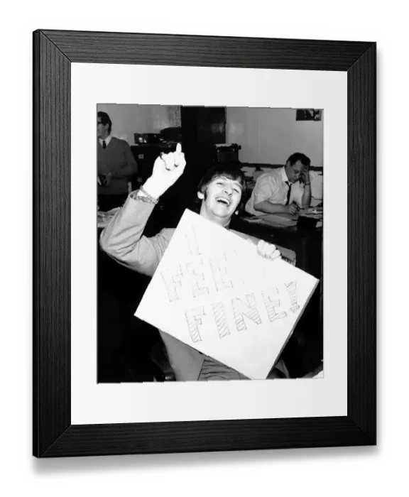 Framed Print : Ringo Starr drummer with the Beatles holding a placard which says I Feel Fine Framed Print : Ringo Starr drummer with the Beatles holding a placard which says I Feel Fine