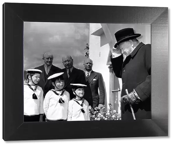 Sir Winston Churchill - May 1959 British Prime Minister raises his hat to 3 young