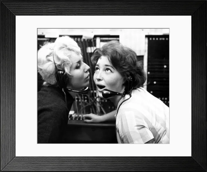 Framed Print : Wicked whispers, September 1960 Girls gossiping in the office Wearing Framed Print : Wicked whispers, September 1960 Girls gossiping in the office Wearing