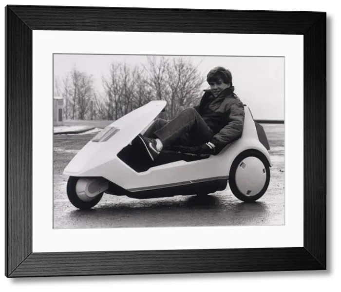 Framed Print : Sinclair C5, 14-year-old Joe Payne trys out the C5 Battery powered tricycle Framed Print : Sinclair C5, 14-year-old Joe Payne trys out the C5 Battery powered tricycle