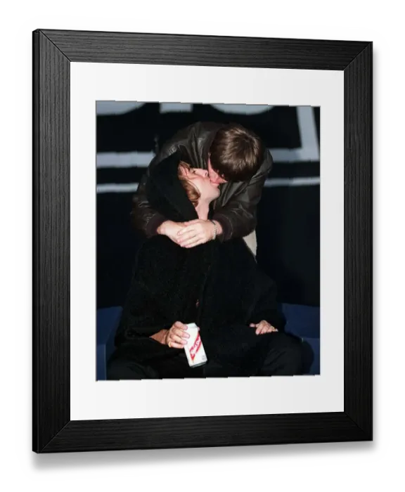 Framed Print : Gallagher brothers Liam and Noel kissing on stage during the OAsis concert at loch Lomond Framed Print : Gallagher brothers Liam and Noel kissing on stage during the OAsis concert at loch Lomond