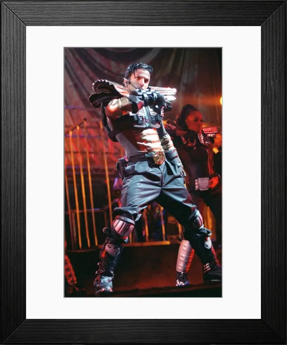 Framed Print : Pop singer Peter Andre performing live on stage at the SECC in Glasgow July 1997
