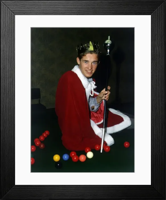 Framed Print : Stephen Hendry sitting on table dressed as a king 1987 Framed Print : Stephen Hendry sitting on table dressed as a king 1987