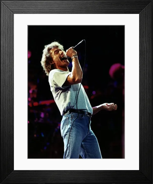 Framed Print : Roger Daltrey Singer from the rock group The Who singing on stage July 1989