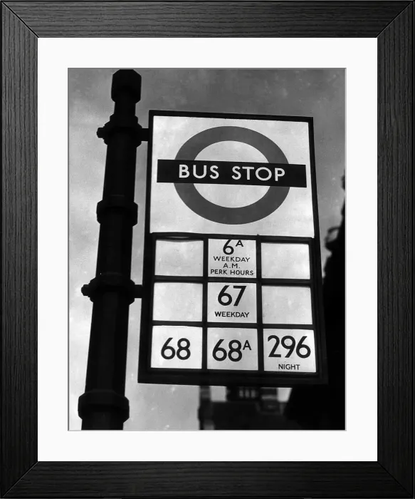 Framed Print : A Bus Stop, showing the bus numbers that stop there - April 1949 Framed Print : A Bus Stop, showing the bus numbers that stop there - April 1949