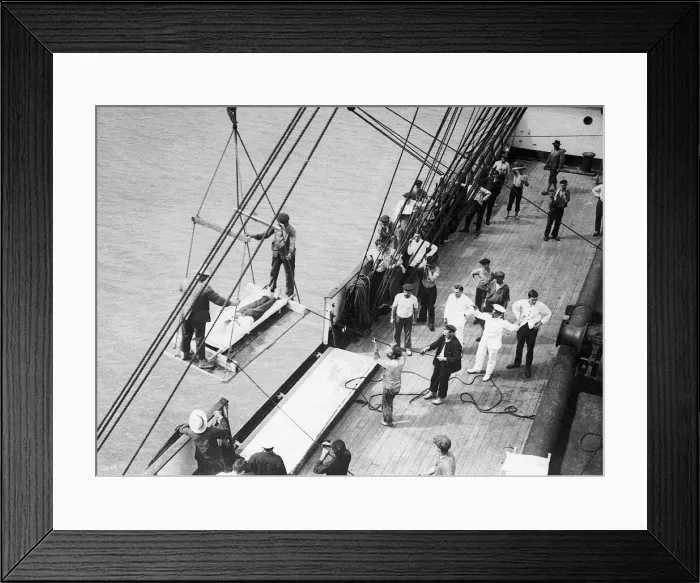 Framed Print : World War I wounded British soldiers are taken on board the hospital ship Pegasus. 1914 Framed Print : World War I wounded British soldiers are taken on board the hospital ship Pegasus. 1914